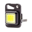 True Utility BUTTONLITE - 47 lumen alto, 16 lumen basso, luce rossa emergenza