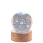 Bagutta Sfera di Cristallo LED Galassia Diametro 6 cm Base in Legno