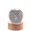 Bagutta Sfera di Cristallo LED Piccolo Principe Diametro 6 cm Base in Legno