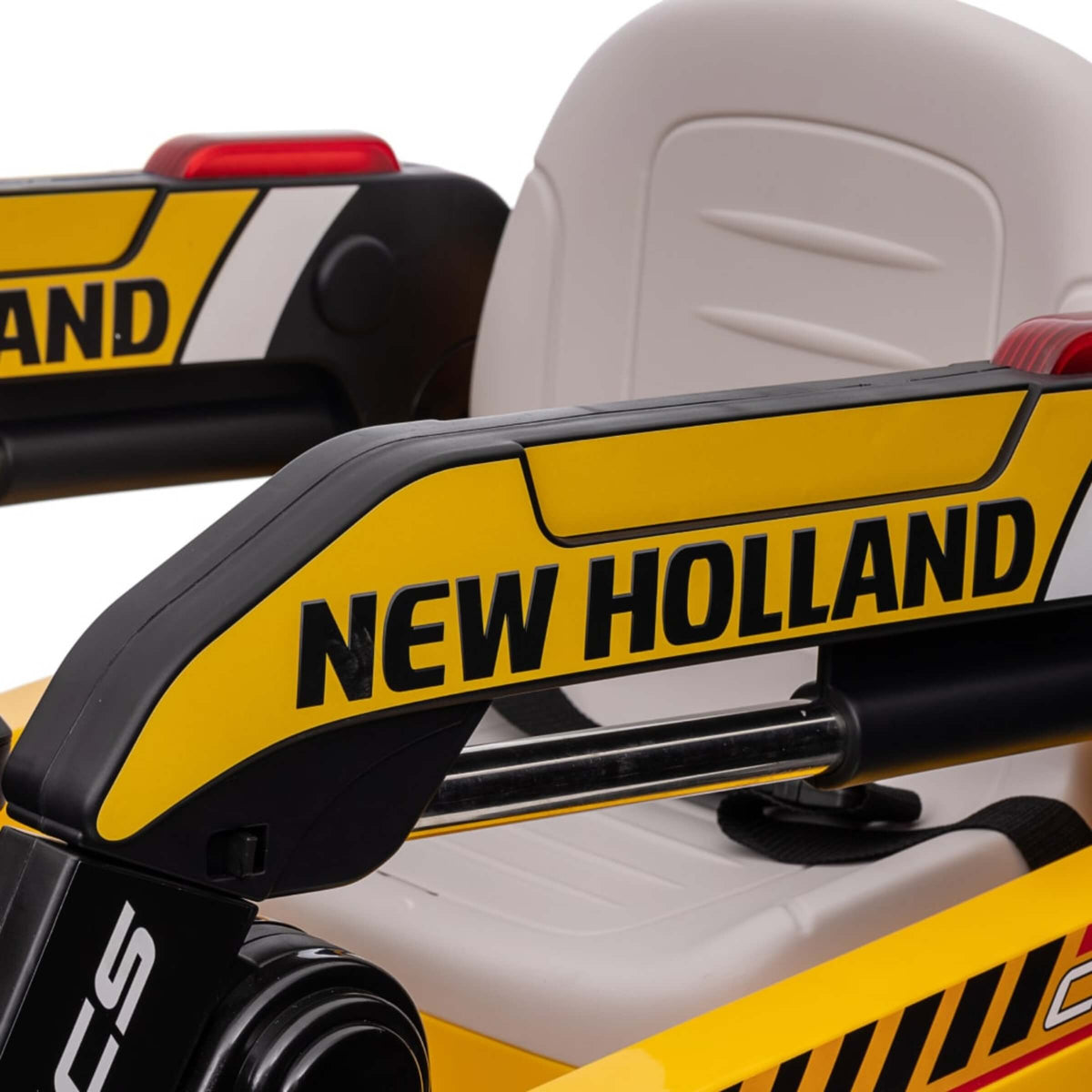 RUSPA ELETTRICA NEW HOLLAND 12V CON TELECOMANDO PARENTALE, DOPPIA VELOCITÀ, LUCI LED, E PALA ANTERIORE -  XMX626-Y