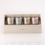Mini candele profumate Lumen in vetro decorato, 4 fragranze assortite